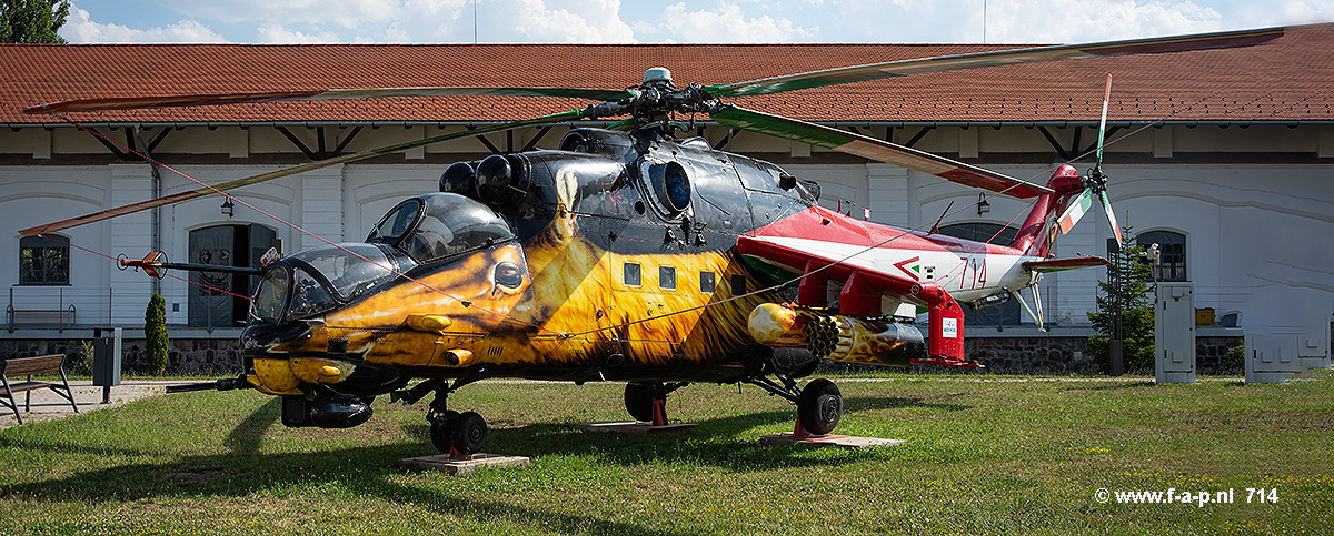 Mil Mi-24V  Hind        714     c/n-K220714   Hungarian "Golden Hind" This Mi-24 based with other helicopters at MH 86. Helicopter Ezred (helicopter wing) at Szolnok AFB and is assigned to 2nd squadron of attack helicopters.now at  RepTr Museum of Szolnok Hungaria   12-07-2024