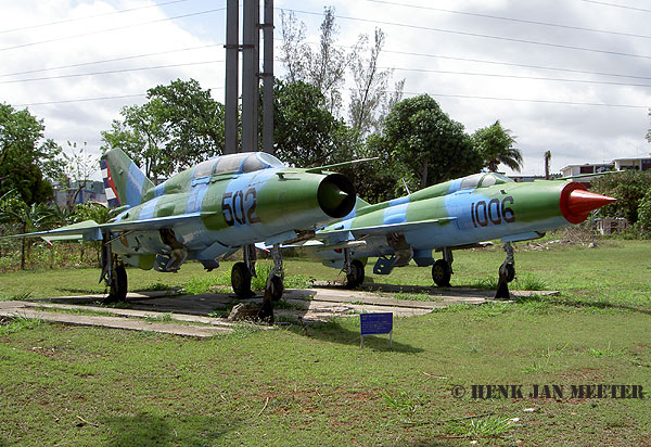 MiG 21 UM 502 & MiG 21 PFM 1006   Museo del Aire Miramar Havana Cuba   03-06-2007