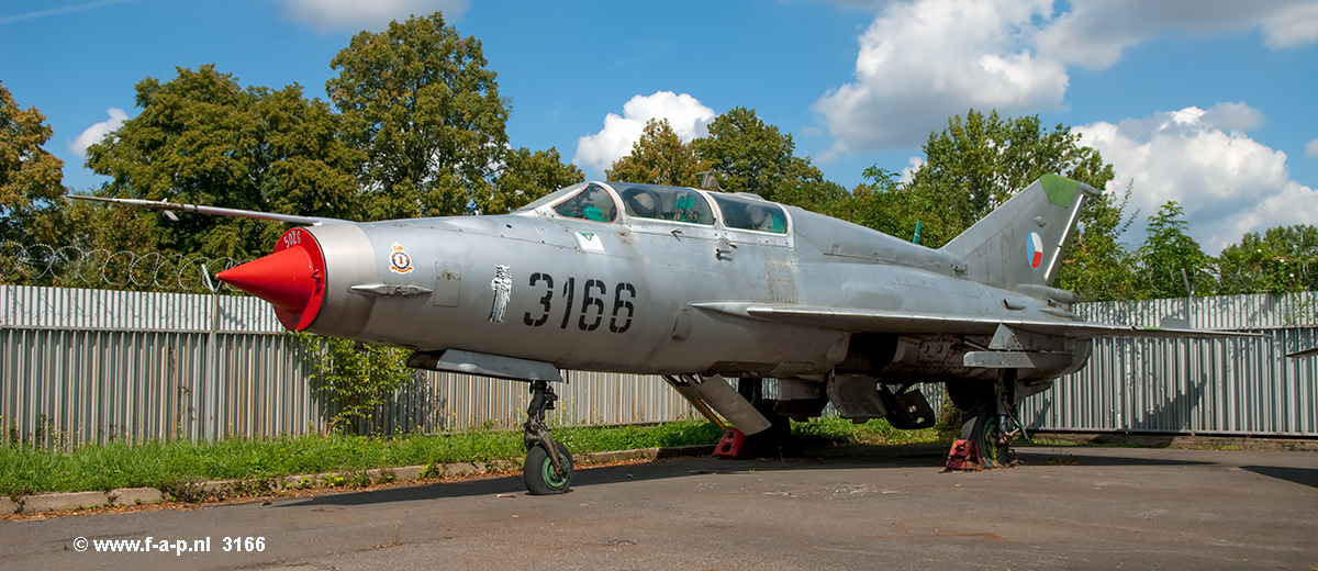 Mikoyan-Gurevich MiG-21UM           3166    c/n-516931066   Badge of 8. slp (fighter aviation regiment) / Brno-Turany AFB was based    Czech Air Force  Kbely (LKKB) - 23-08-2009